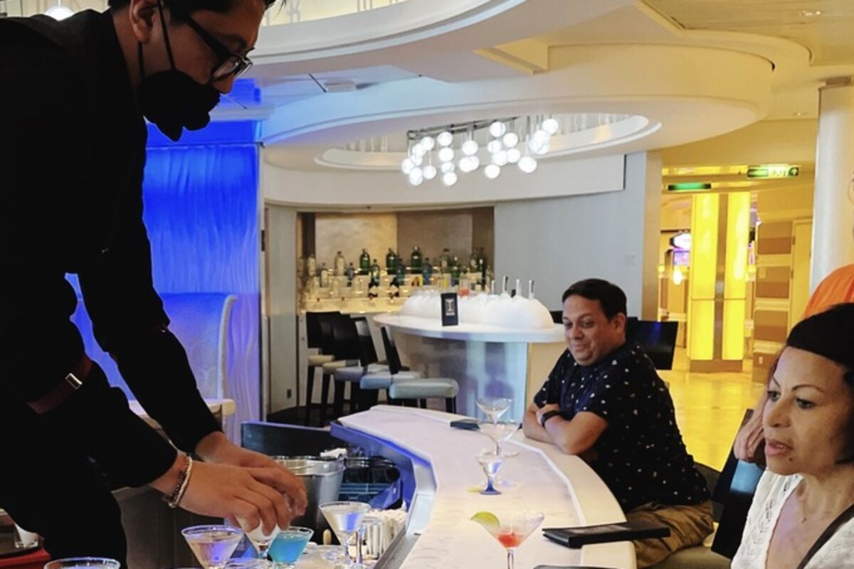 Bartender making drinks.