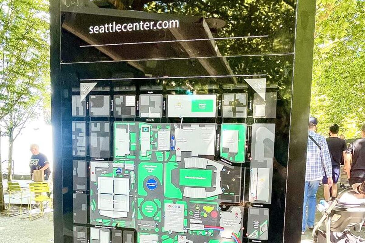 A sign with a map of the Seattle Center